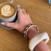 Design By Si Arna armbånd med mønster - Sort/guld Online