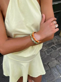 Design By Si Sola armbånd med striber - Orange/guld Clearance